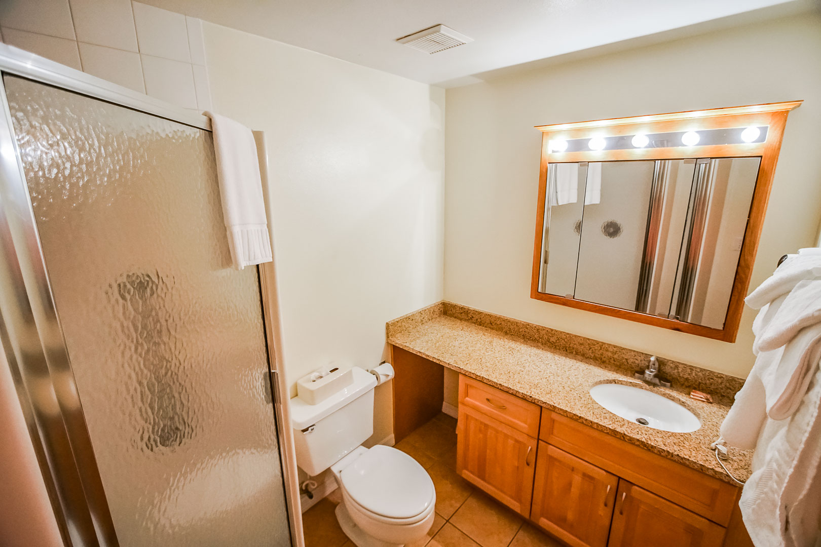 A spacious bathroom at VRI's Discovery Beach Resort in Cocoa Beach, Florida.
